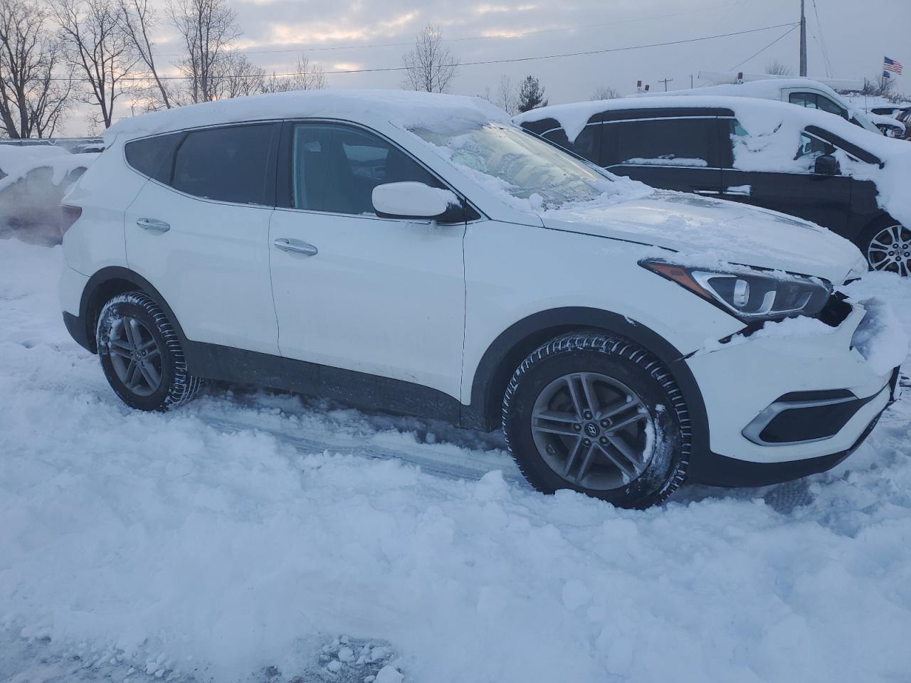 2018 Hyundai Santa Fe VIN 5NMZTDLB2JH052752 Copart auction photo, front end damage thumbnail 4
