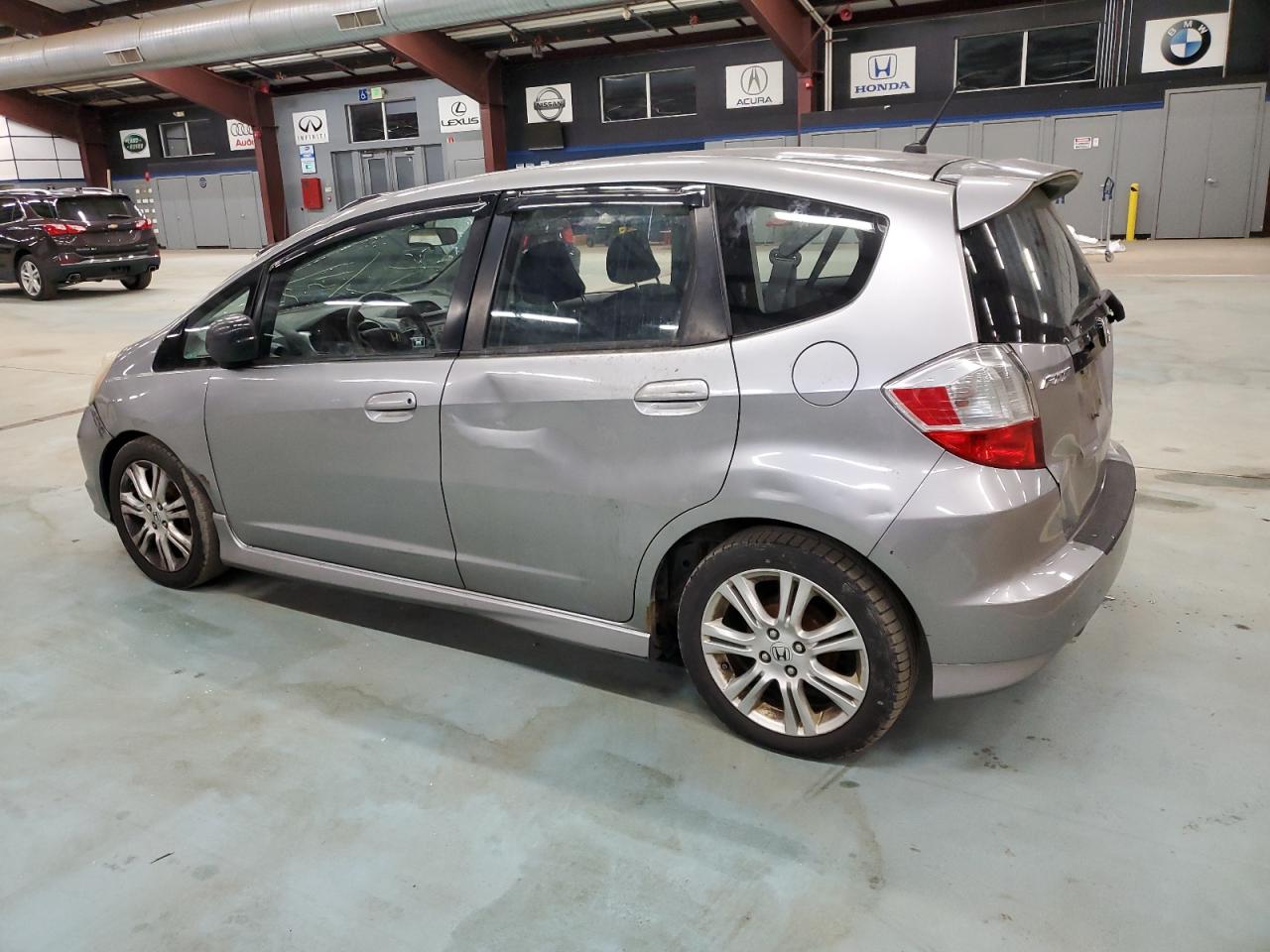 2010 Honda Fit VIN JHMGE8H40AC001976 Copart auction photo, all over / minor dent/scratches damage thumbnail 2