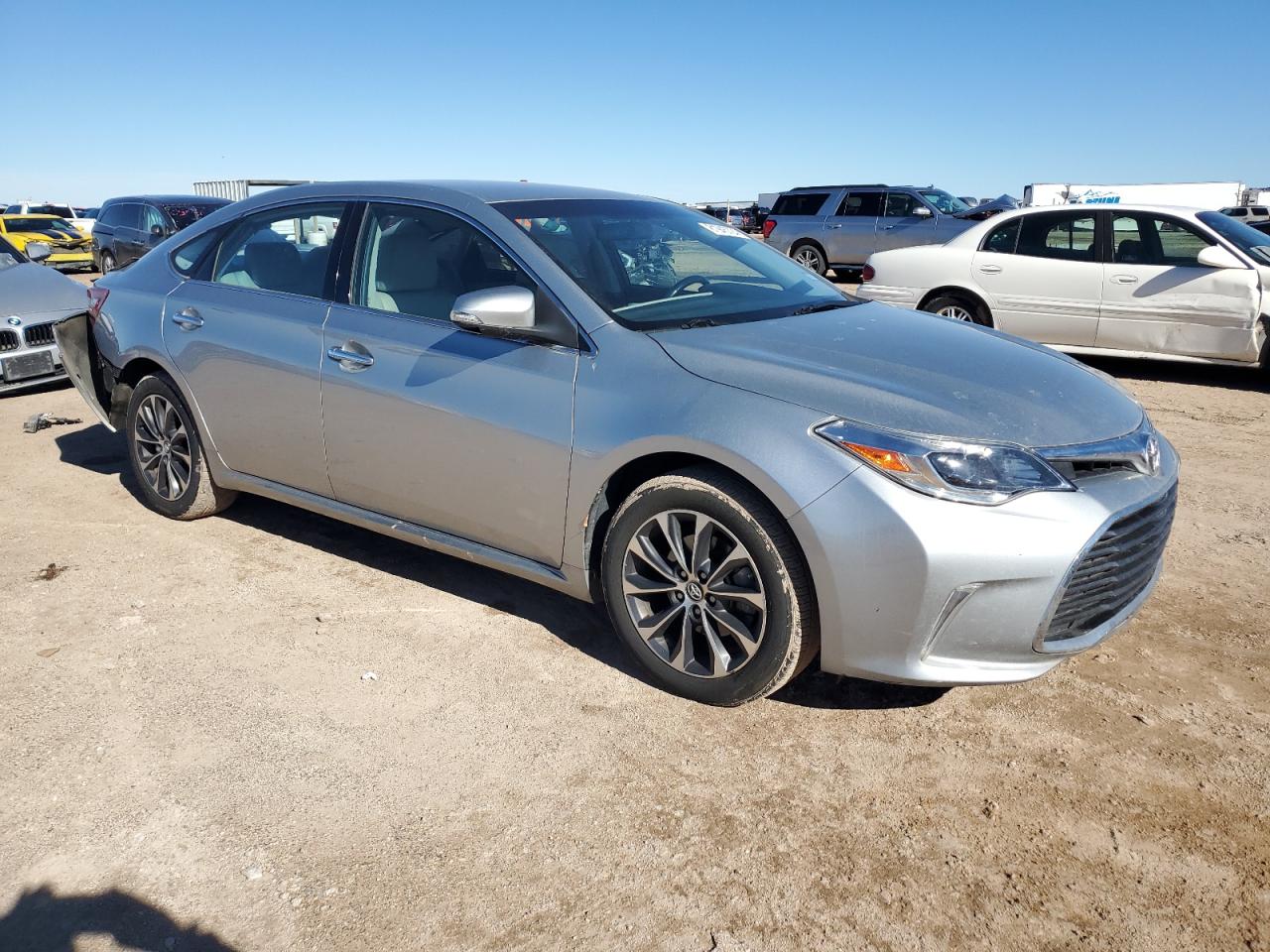 2016 Toyota Avalon VIN 4T1BK1EB8GU215269 Copart auction photo, rear end / minor dent/scratches damage thumbnail 4