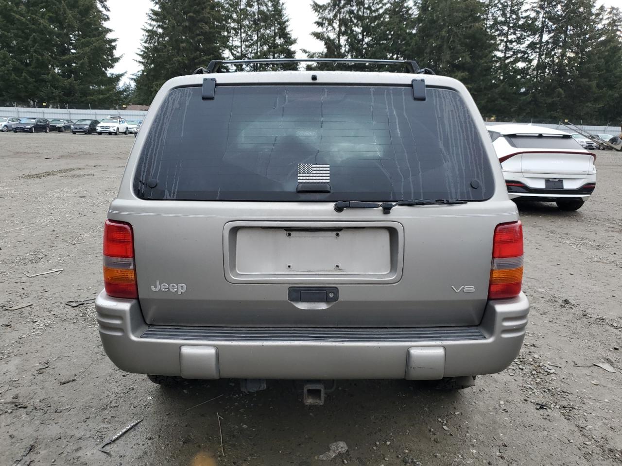 1997 Jeep Grand Cherokee VIN 1J4GZ78Y4VC693193 Copart auction photo, front end damage thumbnail 6
