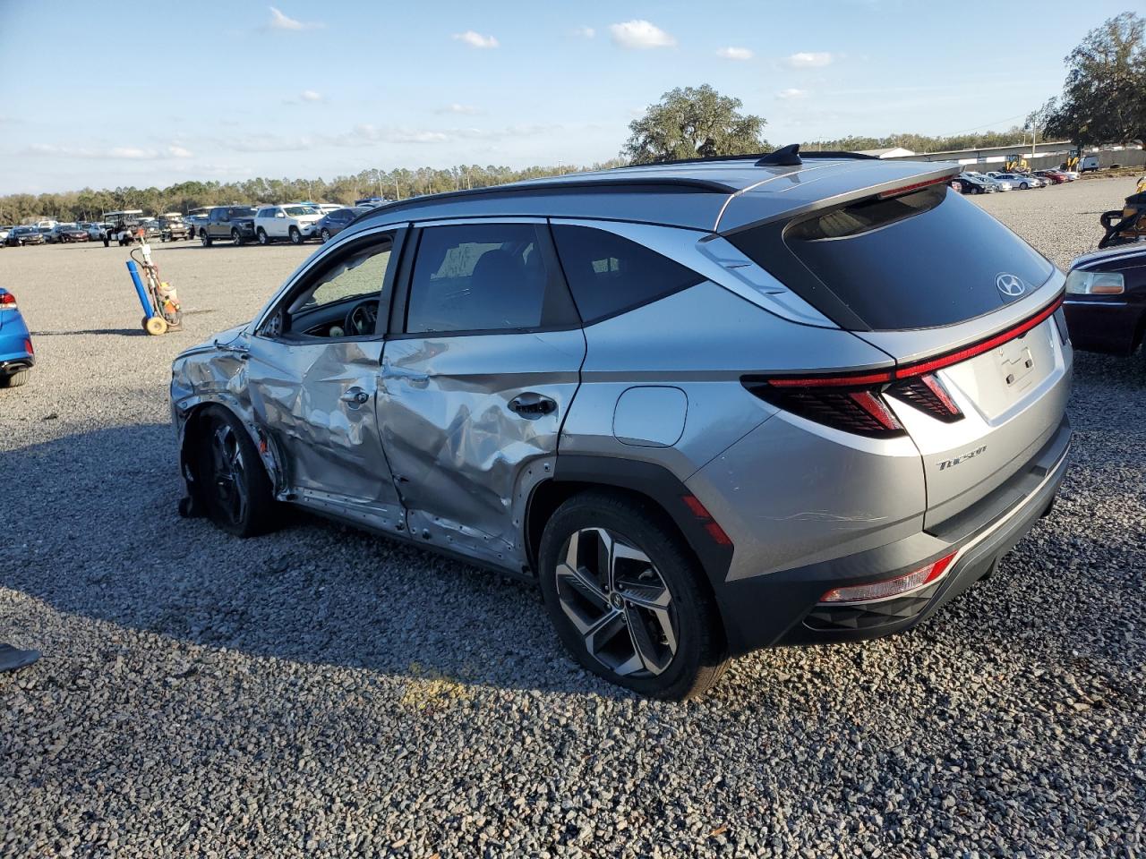 2022 Hyundai Tucson VIN 5NMJC3AE0NH066143 Copart auction photo, side / front end damage thumbnail 2
