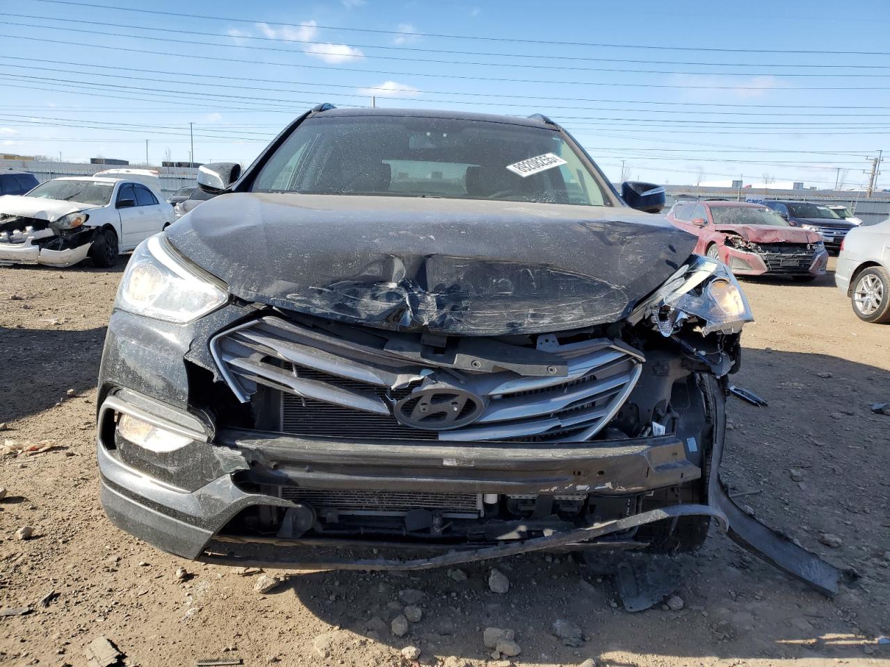 2017 Hyundai Santa Fe VIN 5XYZU4LA6HG475228 Copart auction photo, front end / minor dent/scratches damage thumbnail 5