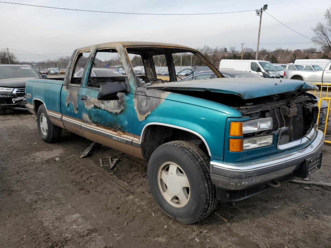 1995 GMC Sierra VIN 2GTEK19K0S1570324 Copart auction photo, burn damage thumbnail 4