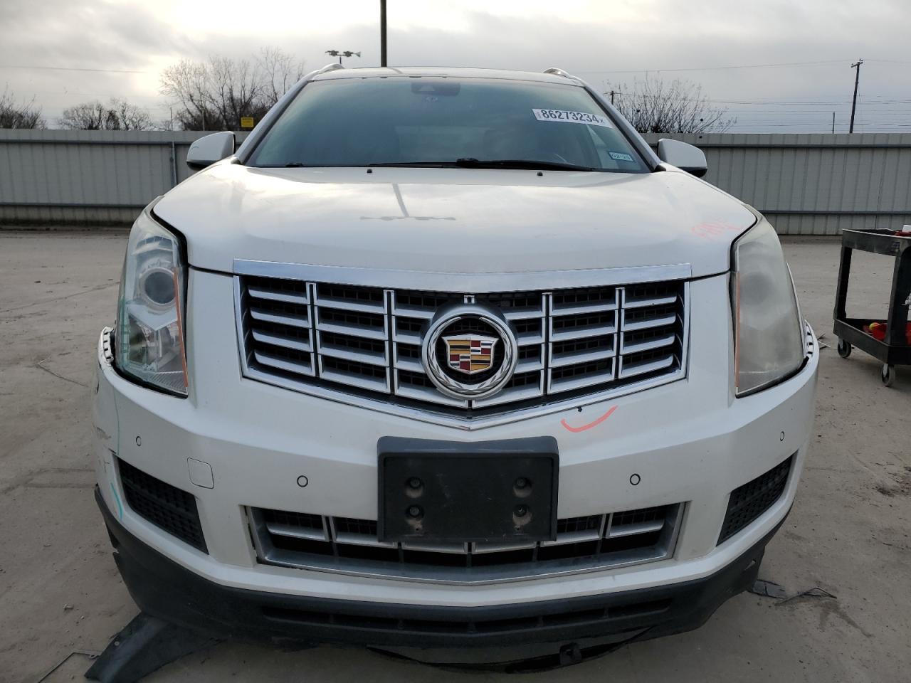 2015 Cadillac SRX VIN 3GYFNBE35FS613060 Copart auction photo, all over damage thumbnail 5