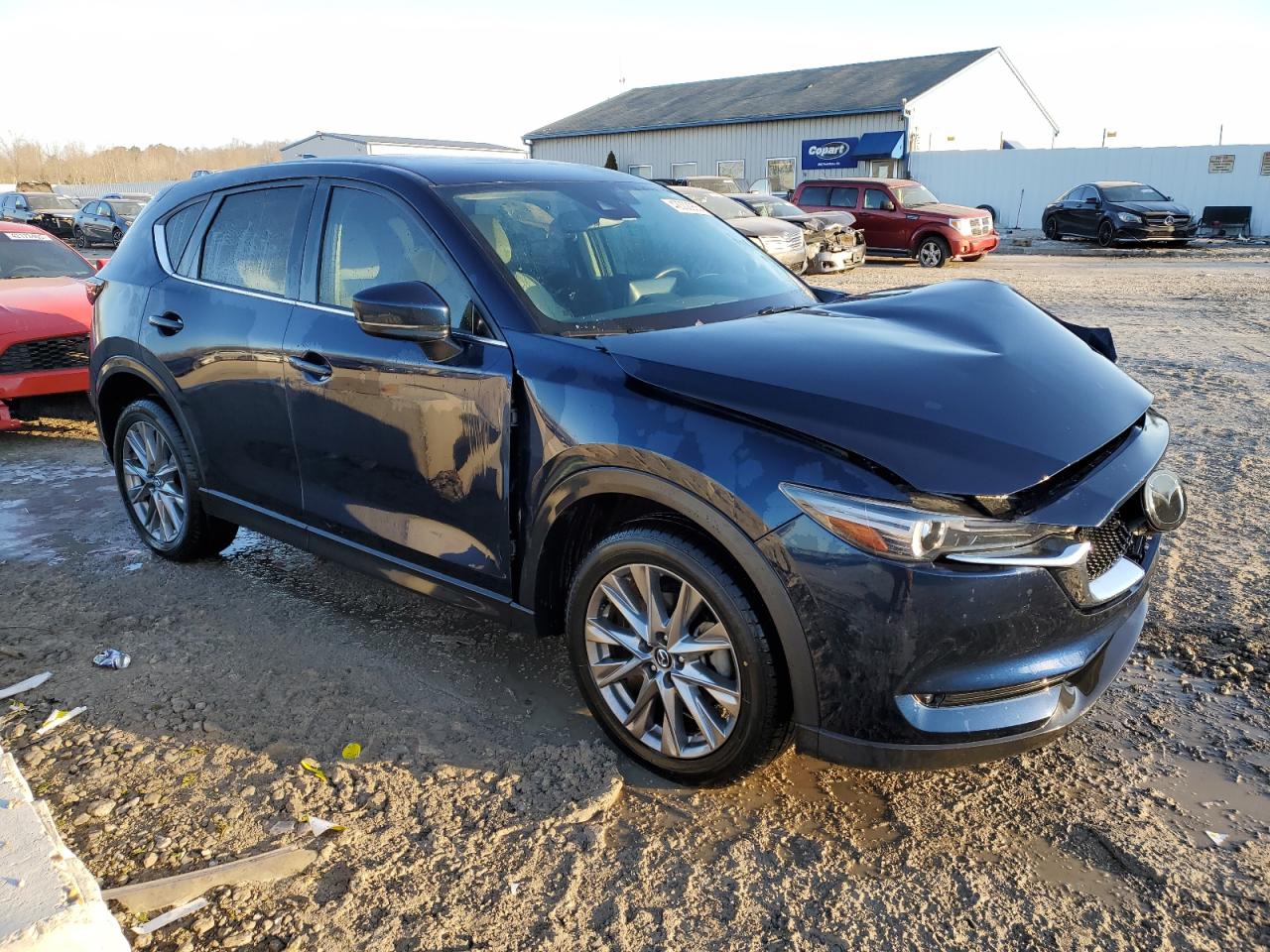 2021 Mazda CX-5 VIN JM3KFBAY4M0467975 Copart auction photo, front end damage thumbnail 4