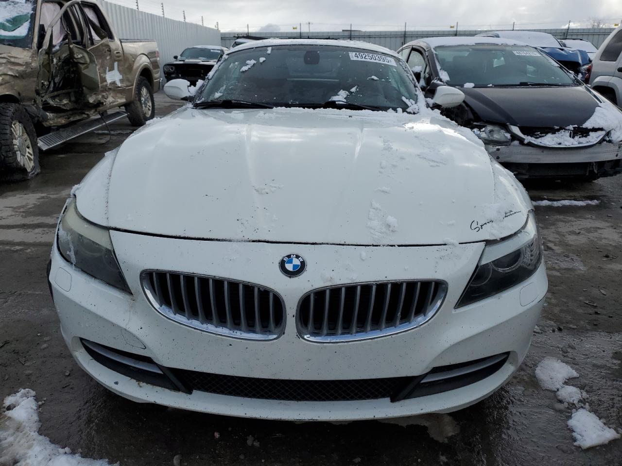 2009 BMW Z4 VIN WBALM53529E160965 Copart auction photo, side damage thumbnail 5
