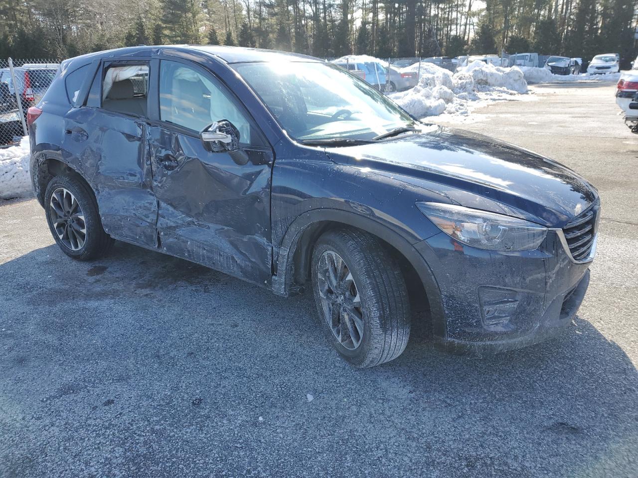 2016 Mazda CX-5 VIN JM3KE4DY9G0885494 Copart auction photo, side / front end damage thumbnail 4