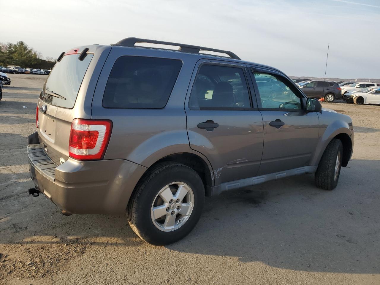 2012 Ford Escape VIN 1FMCU9D74CKA62101 Copart auction photo, side / rear end damage thumbnail 3
