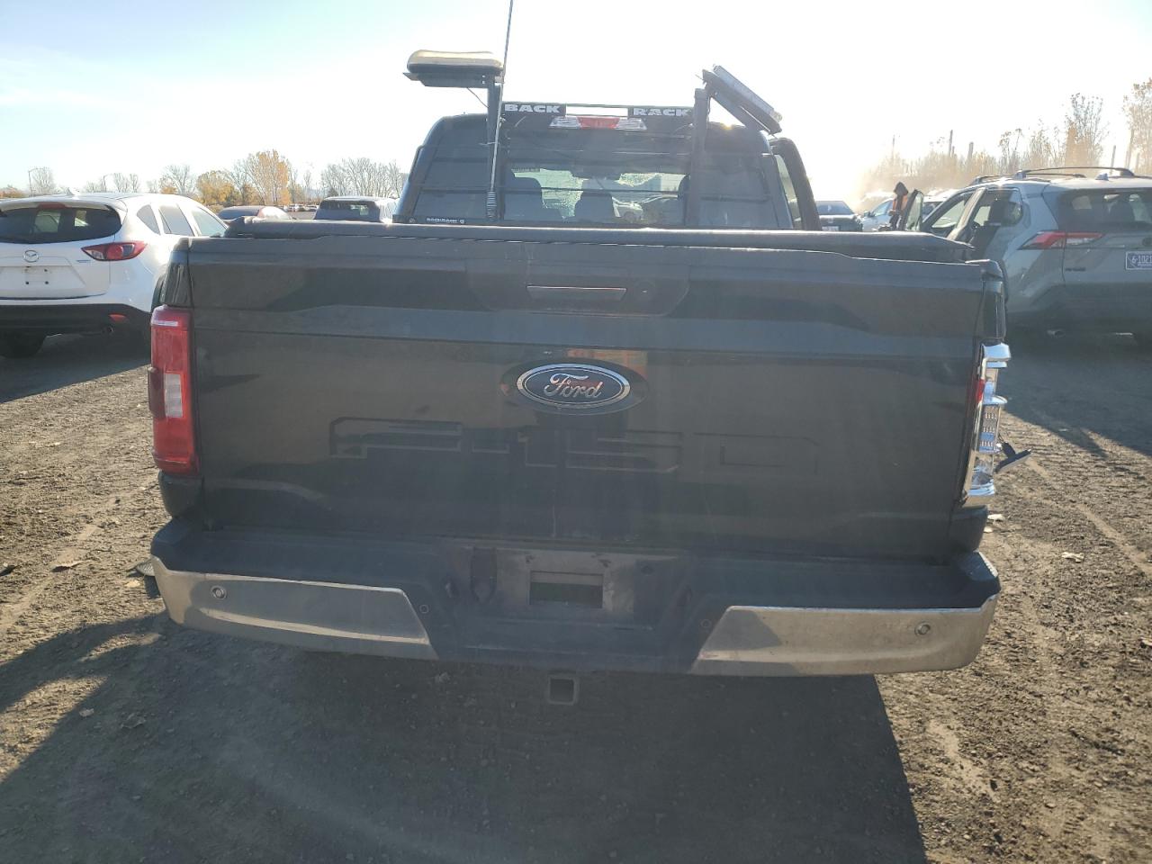 2021 Ford F-150 VIN 1FTFW1E57MFA74814 Copart auction photo, all over damage thumbnail 6