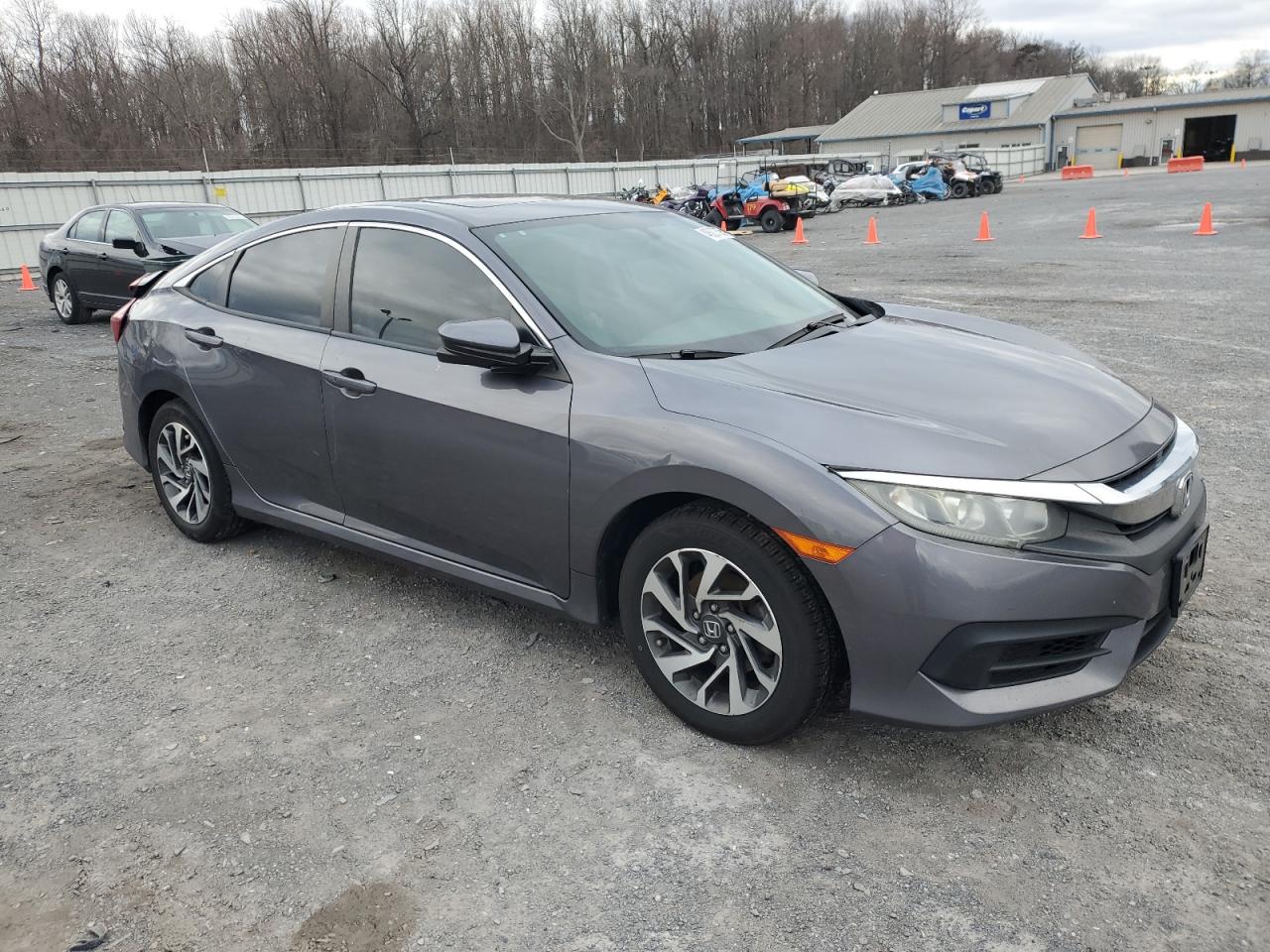 2016 Honda Civic VIN 19XFC2F77GE220528 Copart auction photo, side / rear end damage thumbnail 4