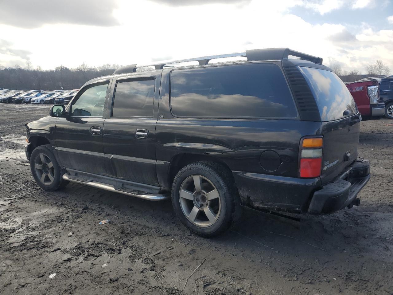 2006 Chevrolet Suburban VIN 3GNFK16U86G117082 Copart auction photo, rear end / undercarriage damage thumbnail 2