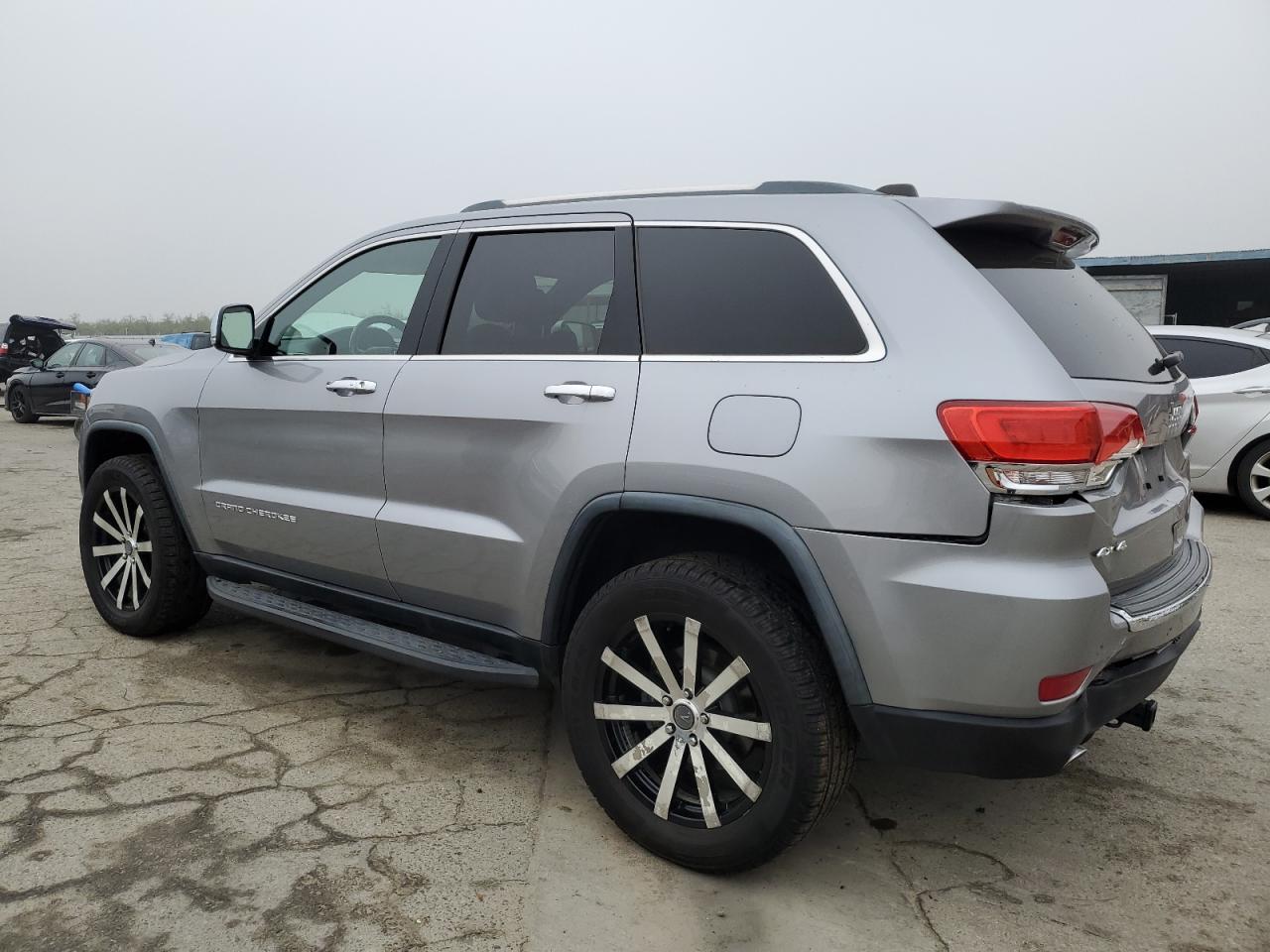 2015 Jeep Grand Cherokee VIN 1C4RJFBT7FC215669 Copart auction photo, rear end / front end damage thumbnail 2