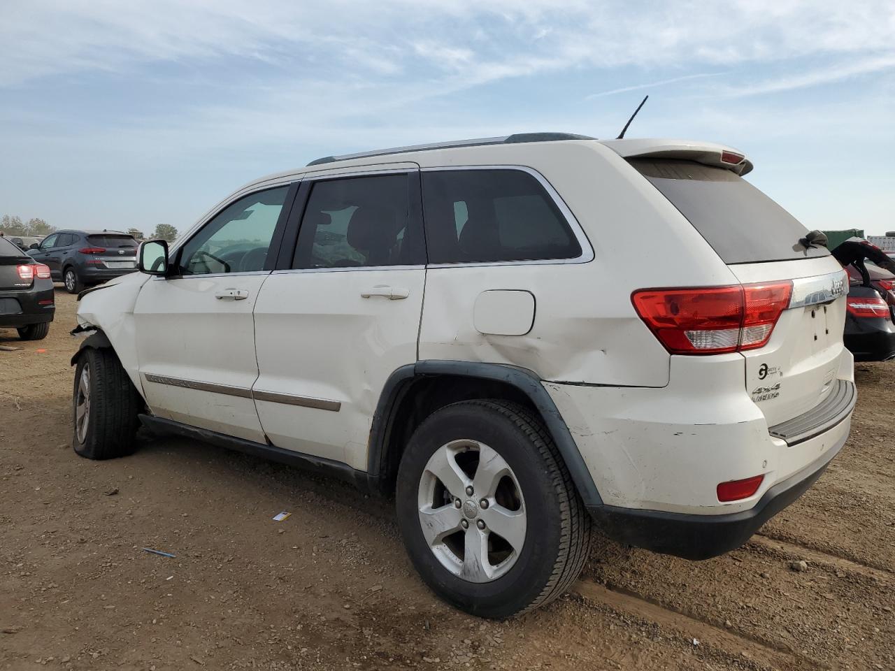 2011 Jeep Grand Cherokee VIN 1J4RR4GG2BC670975 Copart auction photo, front end damage thumbnail 2
