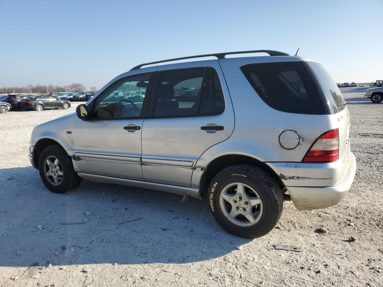 2000 Mercedes-Benz M-klasse VIN 4JGAB54E9YA177973 Copart auction photo, all over damage thumbnail 2