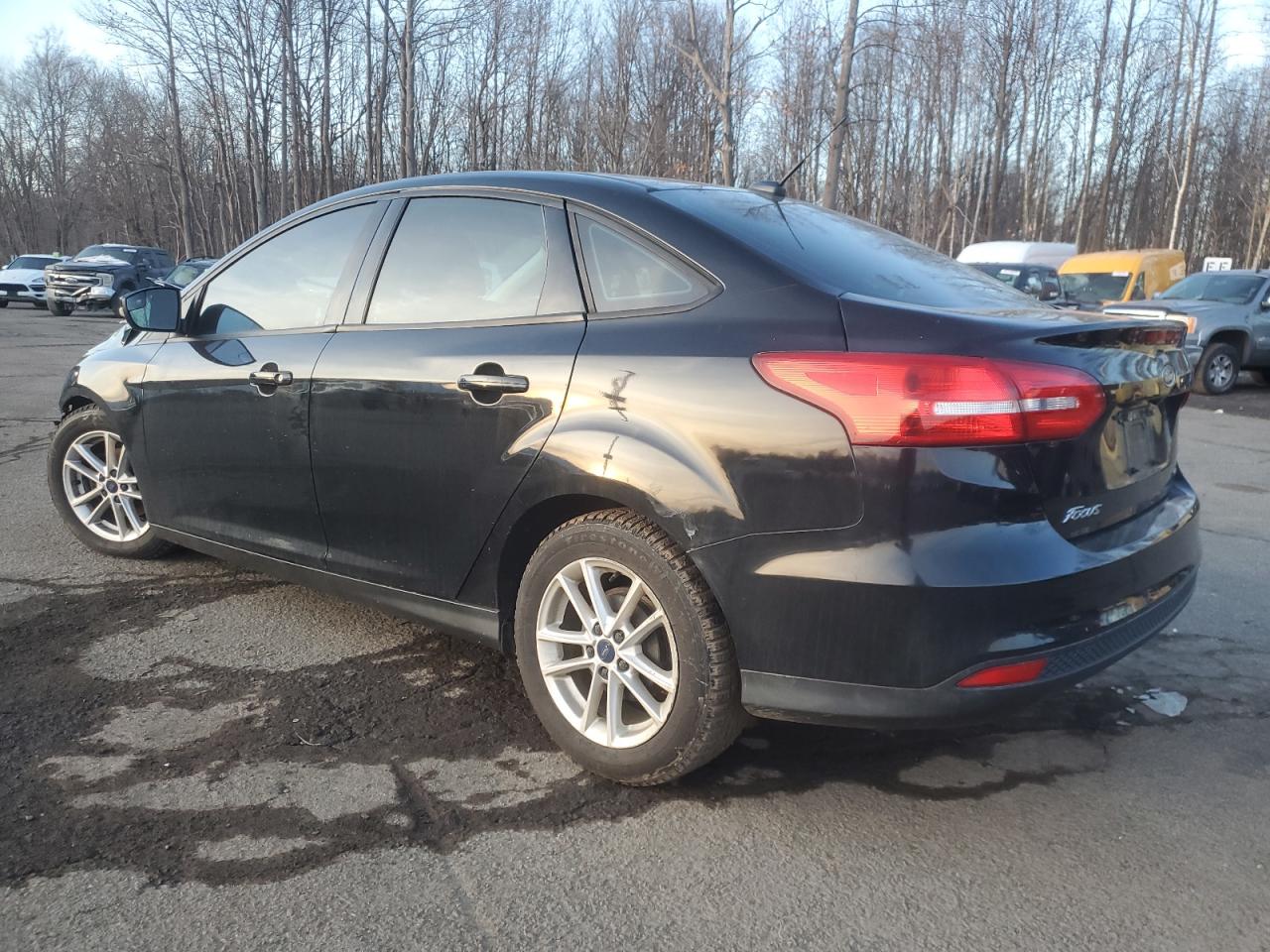2016 Ford Focus VIN 1FADP3F22GL303268 Copart auction photo, front end / minor dent/scratches damage thumbnail 2