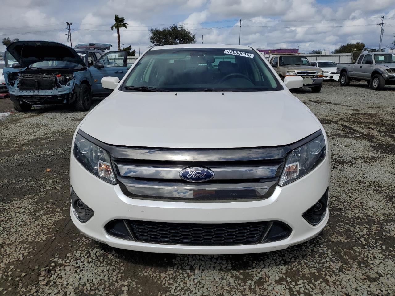 2012 Ford Fusion VIN 3FAHP0KC8CR302295 Copart auction photo, side damage thumbnail 5