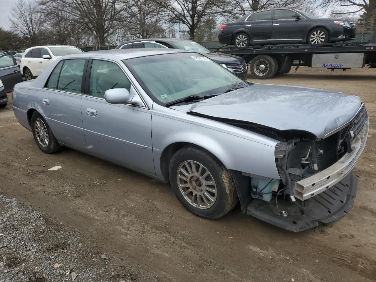 2004 Cadillac De Ville VIN 1G6KE57YX4U252567 Copart auction photo, front end / minor dent/scratches damage thumbnail 4