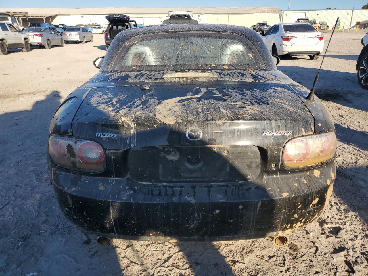2007 Mazda MX-5 VIN JM1NC26F570129706 Copart auction photo, water/flood damage thumbnail 6