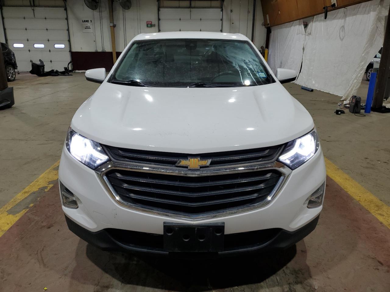 2021 Chevrolet Equinox VIN 3GNAXUEV5MS165575 Copart auction photo, rear end / minor dent/scratches damage thumbnail 5