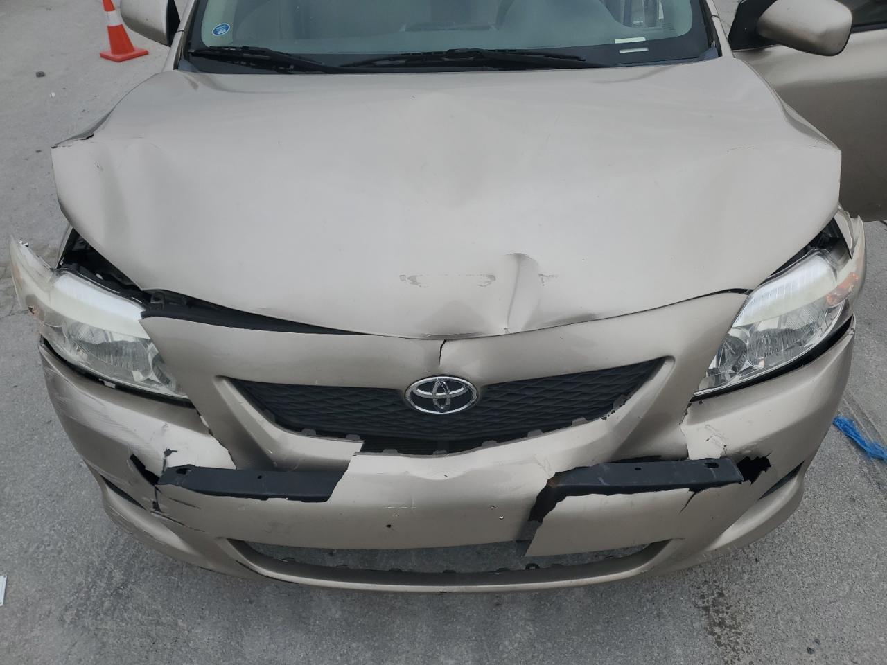 2010 Toyota Corolla VIN 1NXBU4EEXAZ317475 Copart auction photo, front end / rear end damage thumbnail 11