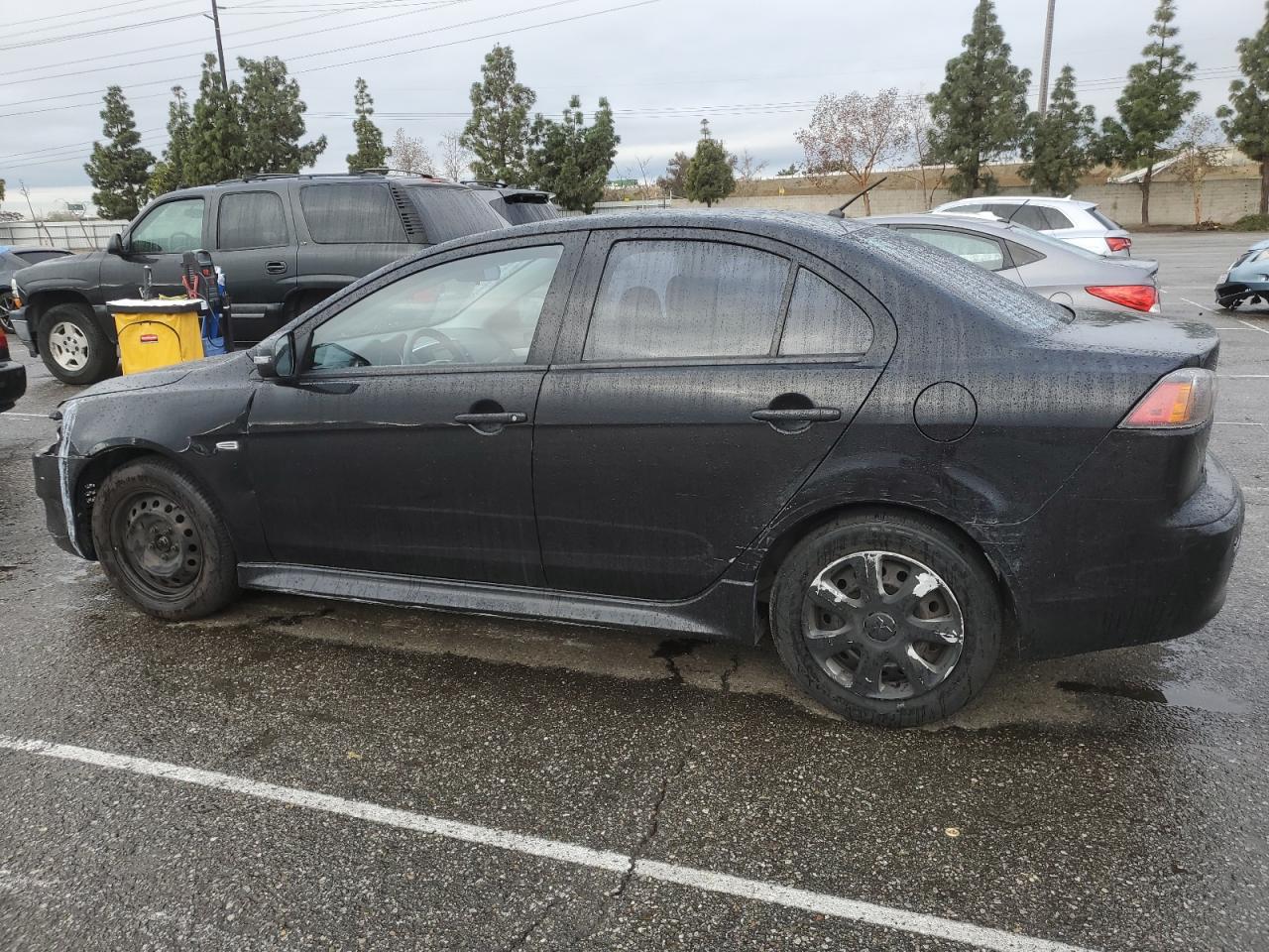 2015 Mitsubishi Lancer VIN JA32U2FU5FU021767 Copart auction photo, front end / side damage thumbnail 2