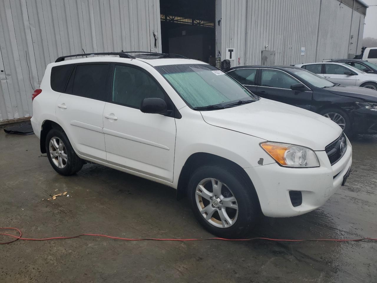 2012 Toyota RAV 4 VIN 2T3BF4DV4CW233657 Copart auction photo, side damage thumbnail 4