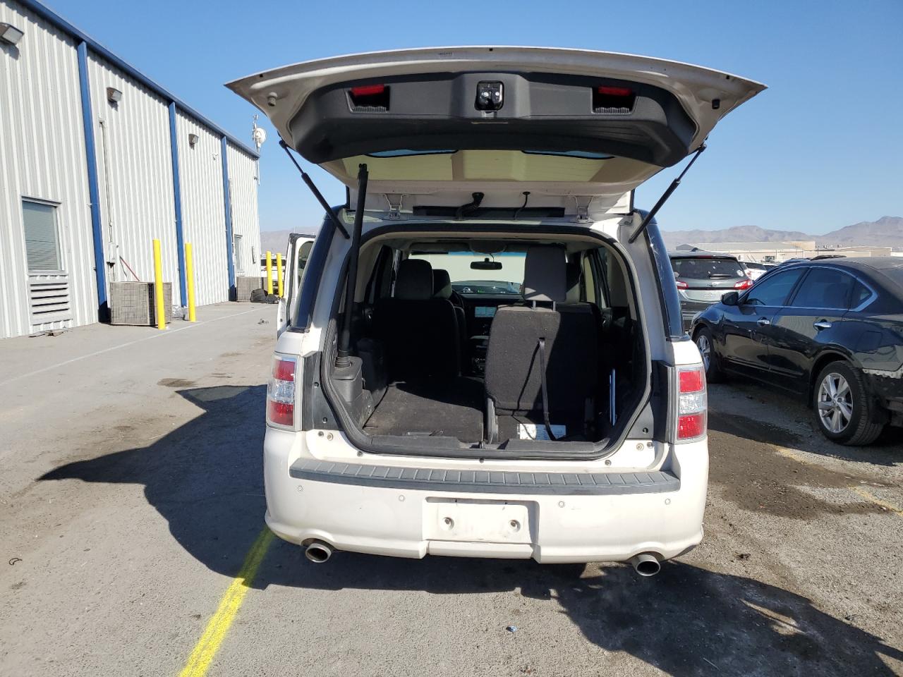 2016 Ford Flex VIN 2FMGK5C8XGBA11583 Copart auction photo, front end damage thumbnail 6