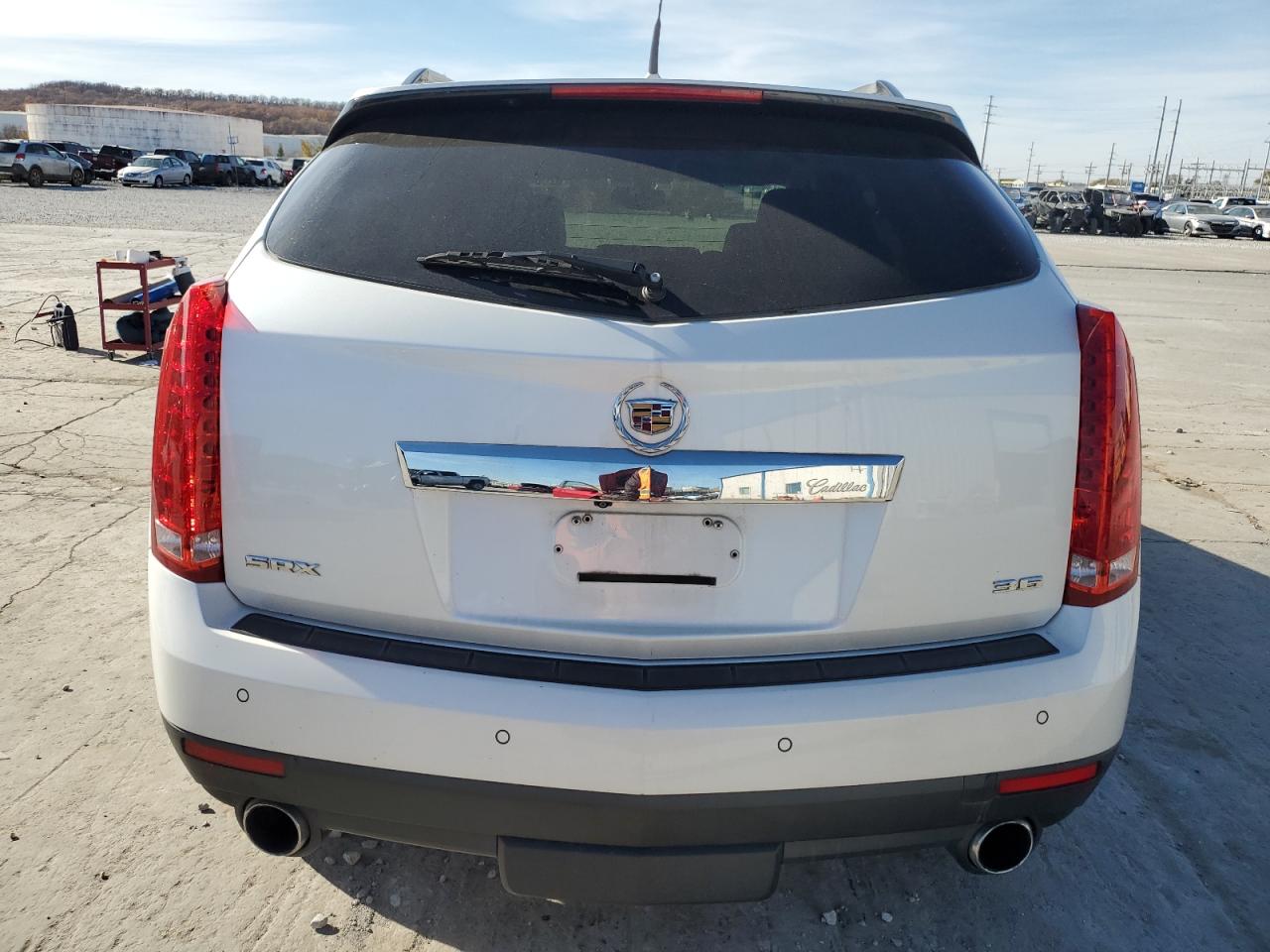 2014 Cadillac SRX VIN 3GYFNBE30ES519702 Copart auction photo, front end / side damage thumbnail 6