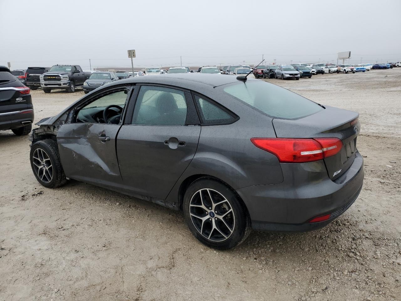 2017 Ford Focus VIN 1FADP3FE7HL290156 Copart auction photo, side / front end damage thumbnail 2