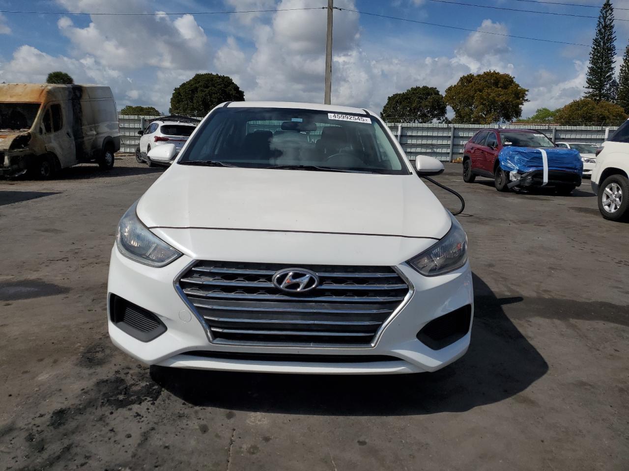 2019 Hyundai Accent VIN 3KPC24A30KE051919 Copart auction photo, all over damage thumbnail 5