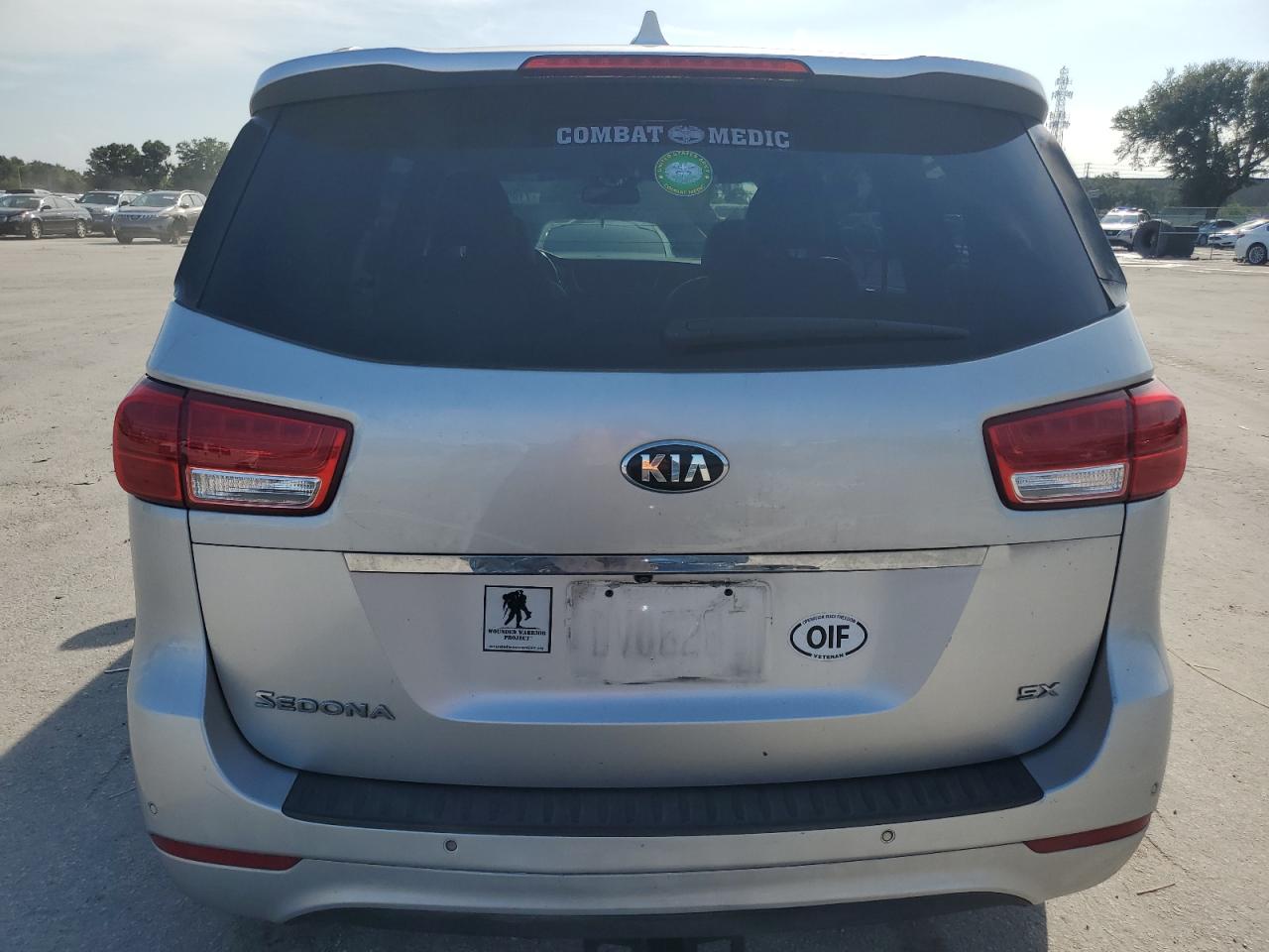 2016 KIA Sedona VIN KNDMC5C19G6149301 Copart auction photo, burn damage thumbnail 6