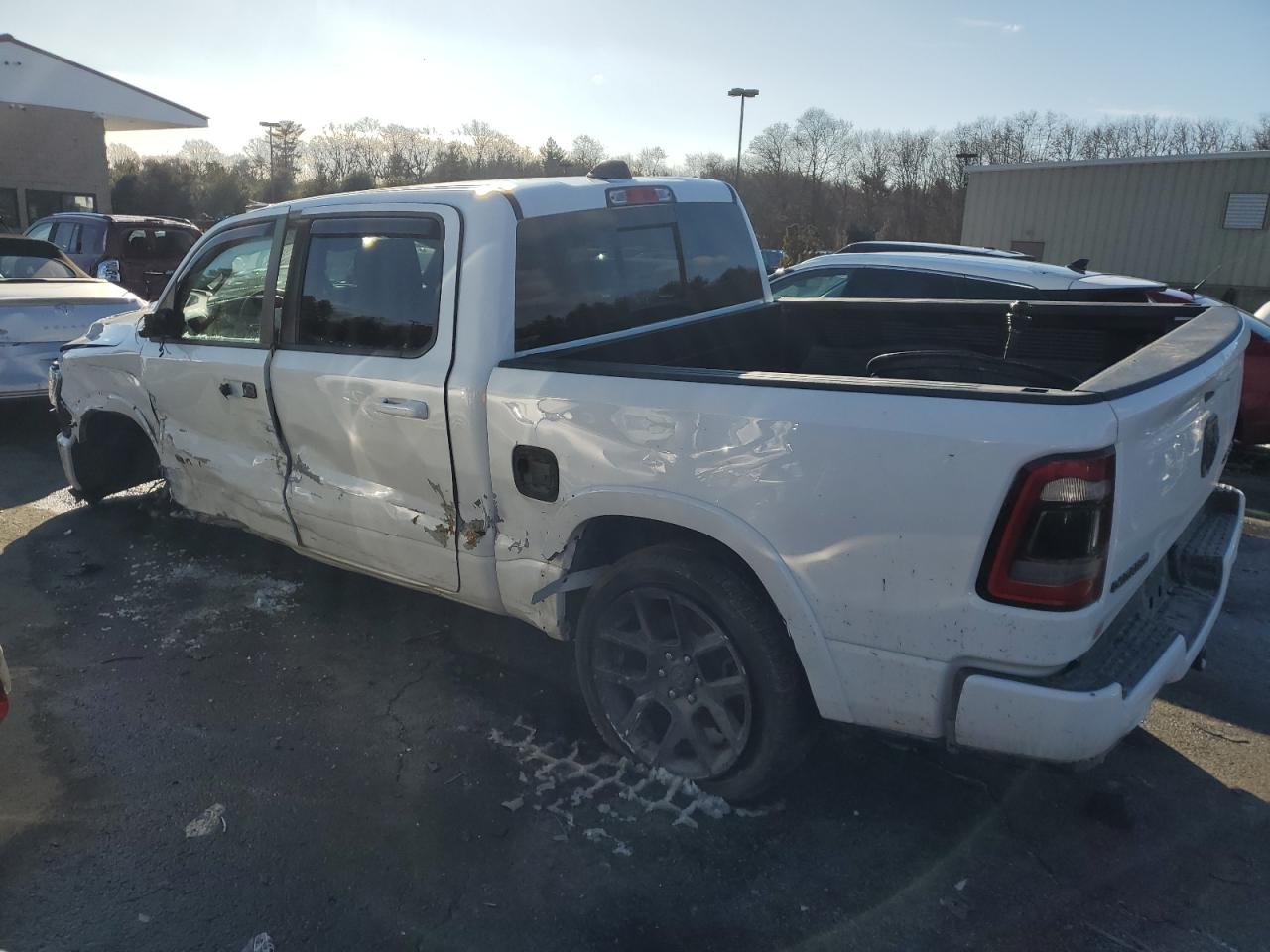 2020 RAM 1500 VIN 1C6SRFJT6LN211454 Copart auction photo, side / front end damage thumbnail 2