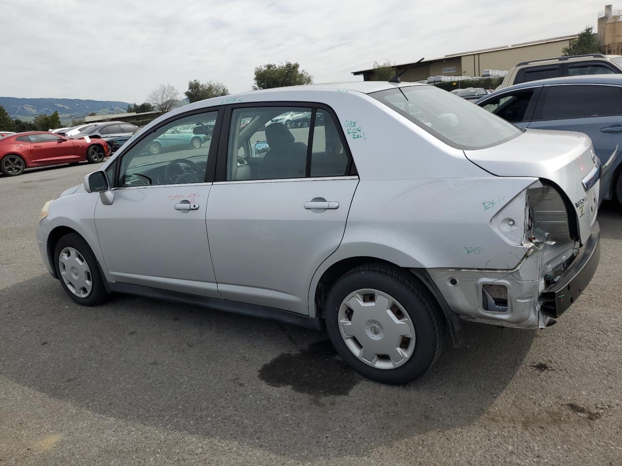 2009 Nissan Versa VIN 3N1BC11E69L374261 Copart auction photo, rear end damage thumbnail 2