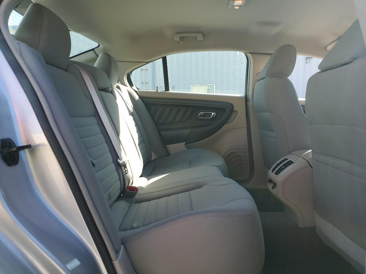 2012 Ford Taurus VIN 1FAHP2DW4CG122242 Copart auction photo, rear end / hail damage thumbnail 10