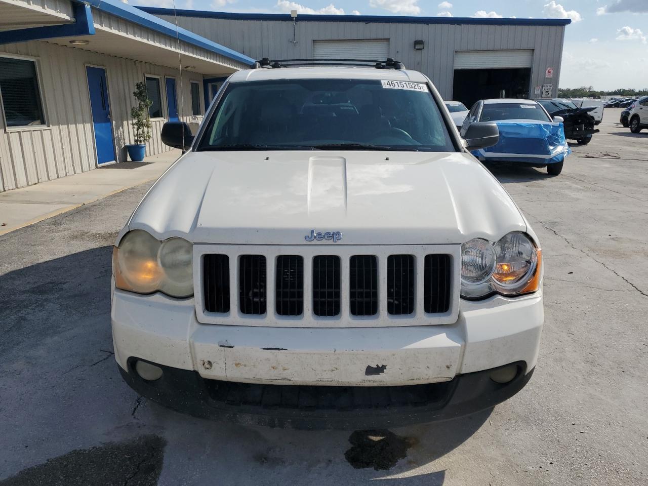 2009 Jeep Grand Cherokee VIN 1J8GS48K69C520164 Copart auction photo, rear end / minor dent/scratches damage thumbnail 5