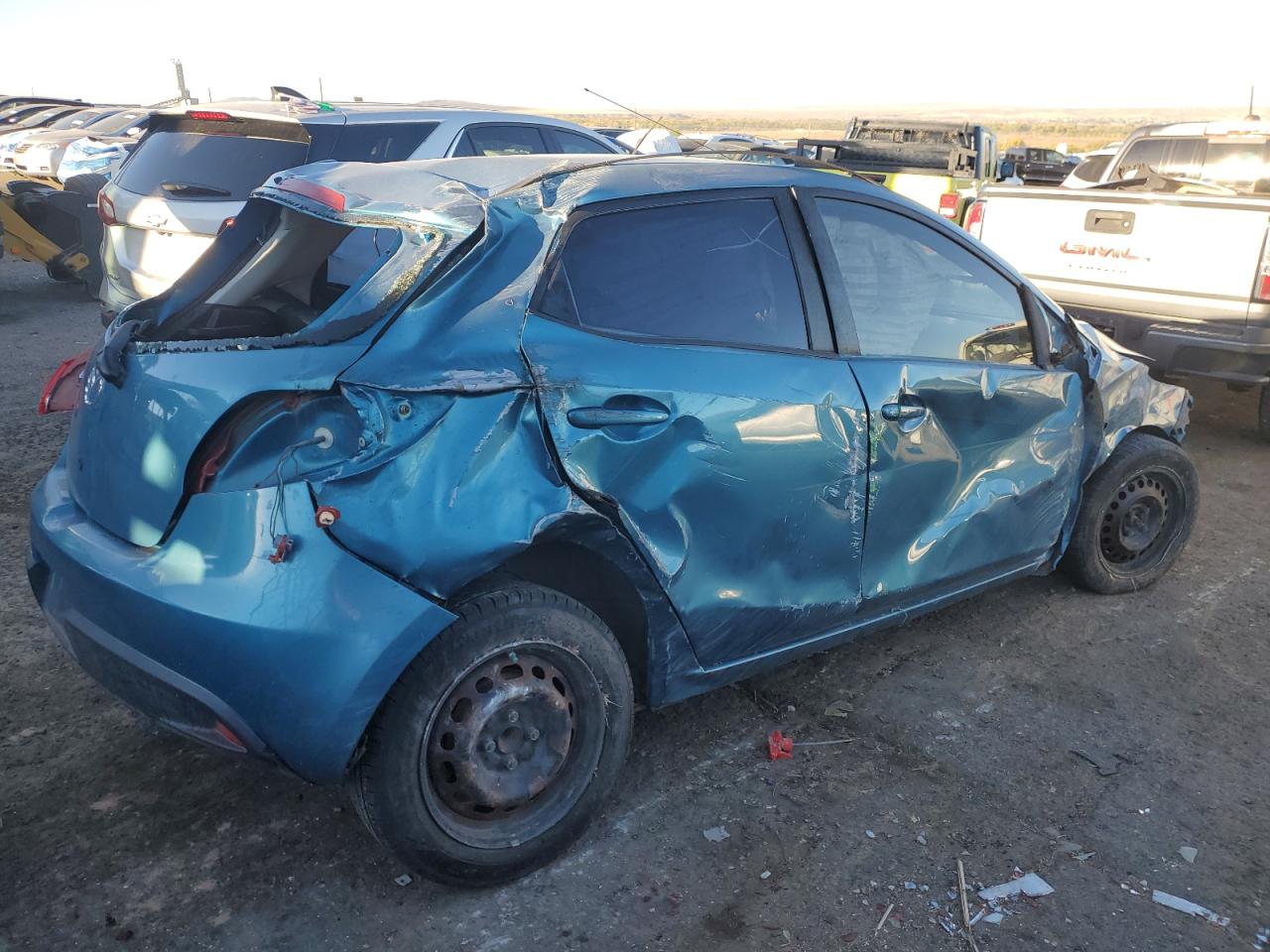 2012 Mazda 2 VIN JM1DE1KZ7C0147229 Copart auction photo, rollover damage thumbnail 3