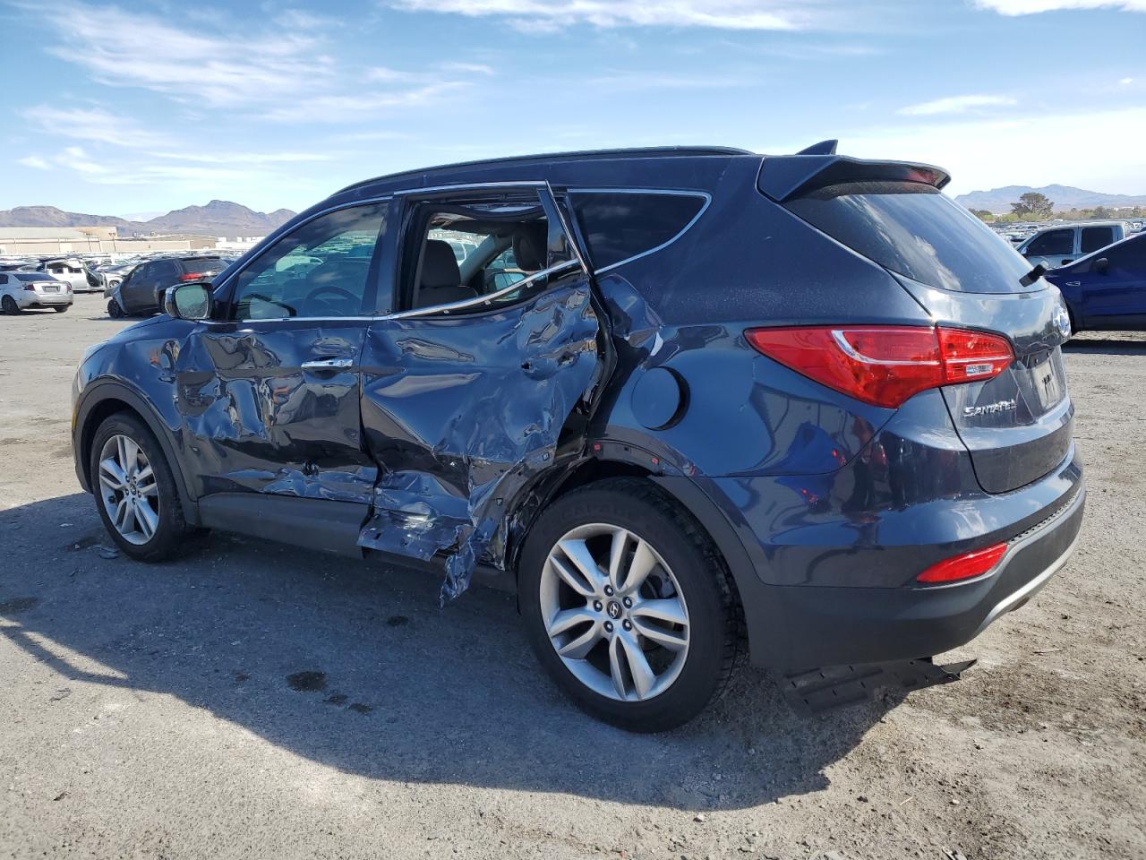 2014 Hyundai Santa Fe VIN 5XYZUDLA3EG182317 Copart auction photo, side damage thumbnail 2