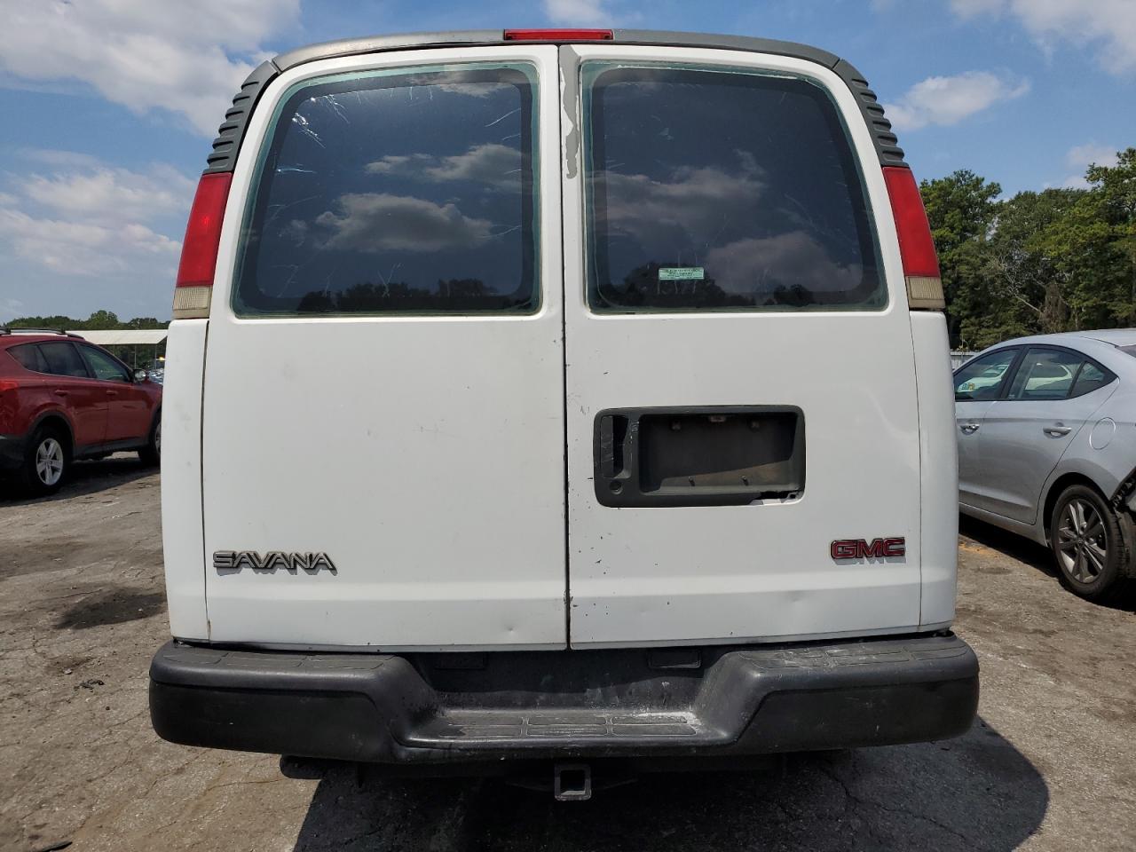 1998 GMC Savana VIN 1GTHG35R0W1009940 Copart auction photo, side damage thumbnail 6