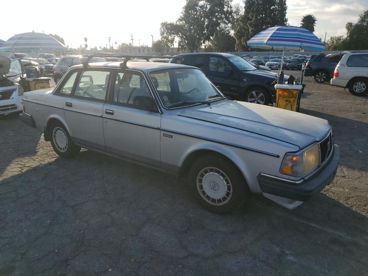 1990 Volvo 240 Series VIN YV1AA8844L1393744 Copart auction photo, front end damage thumbnail 4