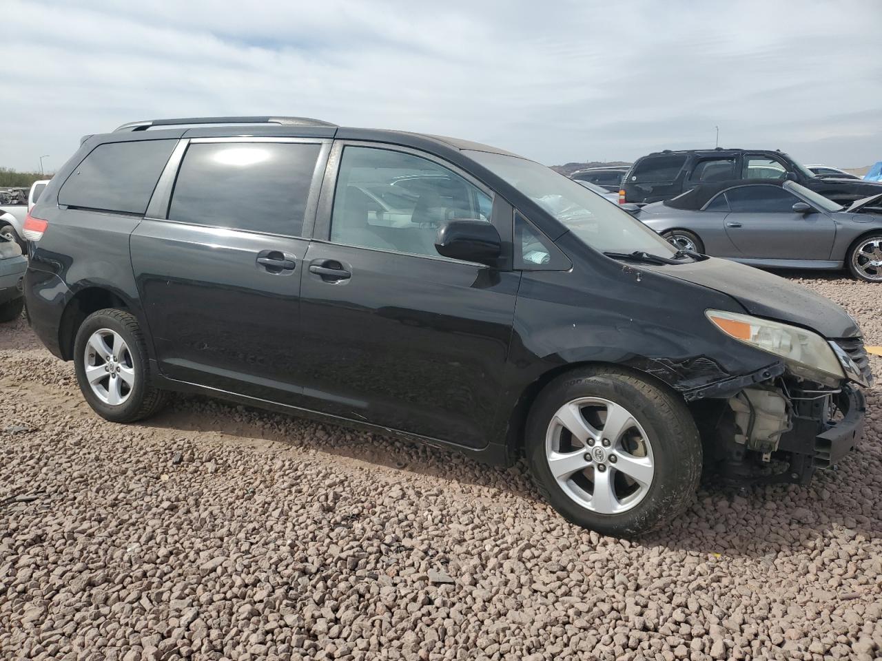 2011 Toyota Sienna VIN 5TDKK3DC7BS130107 Copart auction photo, front end / side damage thumbnail 4