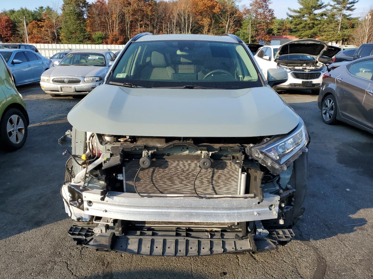 2019 Toyota RAV 4 VIN JTMP1RFV6KD040663 Copart auction photo, all over damage thumbnail 5
