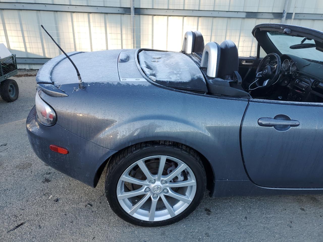 2006 Mazda MX-5 VIN JM1NC25F060101411 Copart auction photo, burn - interior damage thumbnail 10