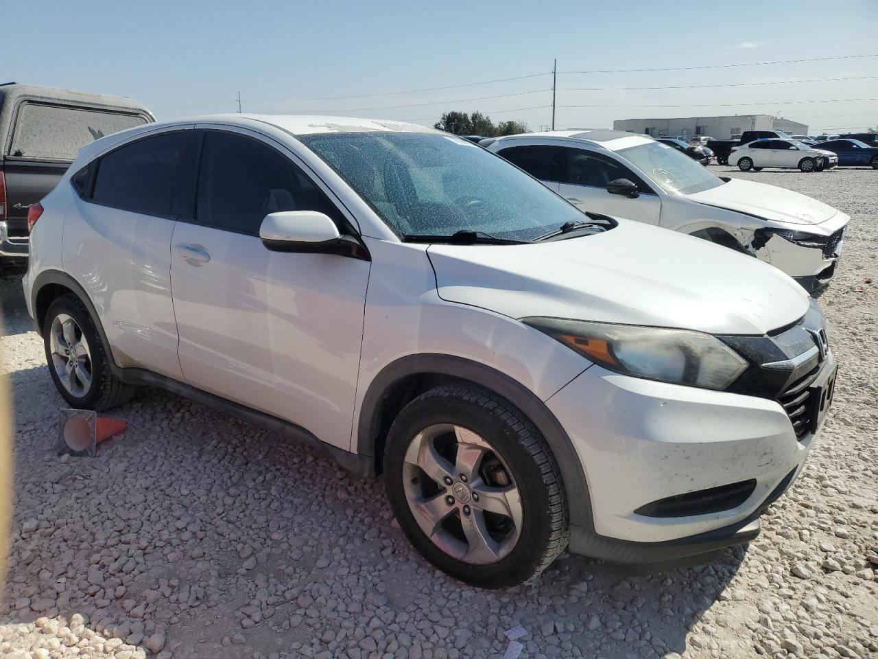 2016 Honda HR-V VIN 3CZRU5H39GM700897 Copart auction photo, side / minor dent/scratches damage thumbnail 4