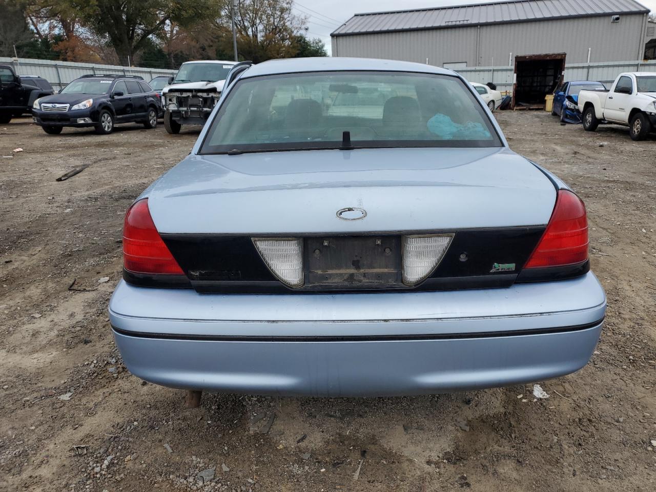 2001 Ford Crown Victoria VIN 2FAFP71W61X161009 Copart auction photo, side / front end damage thumbnail 6