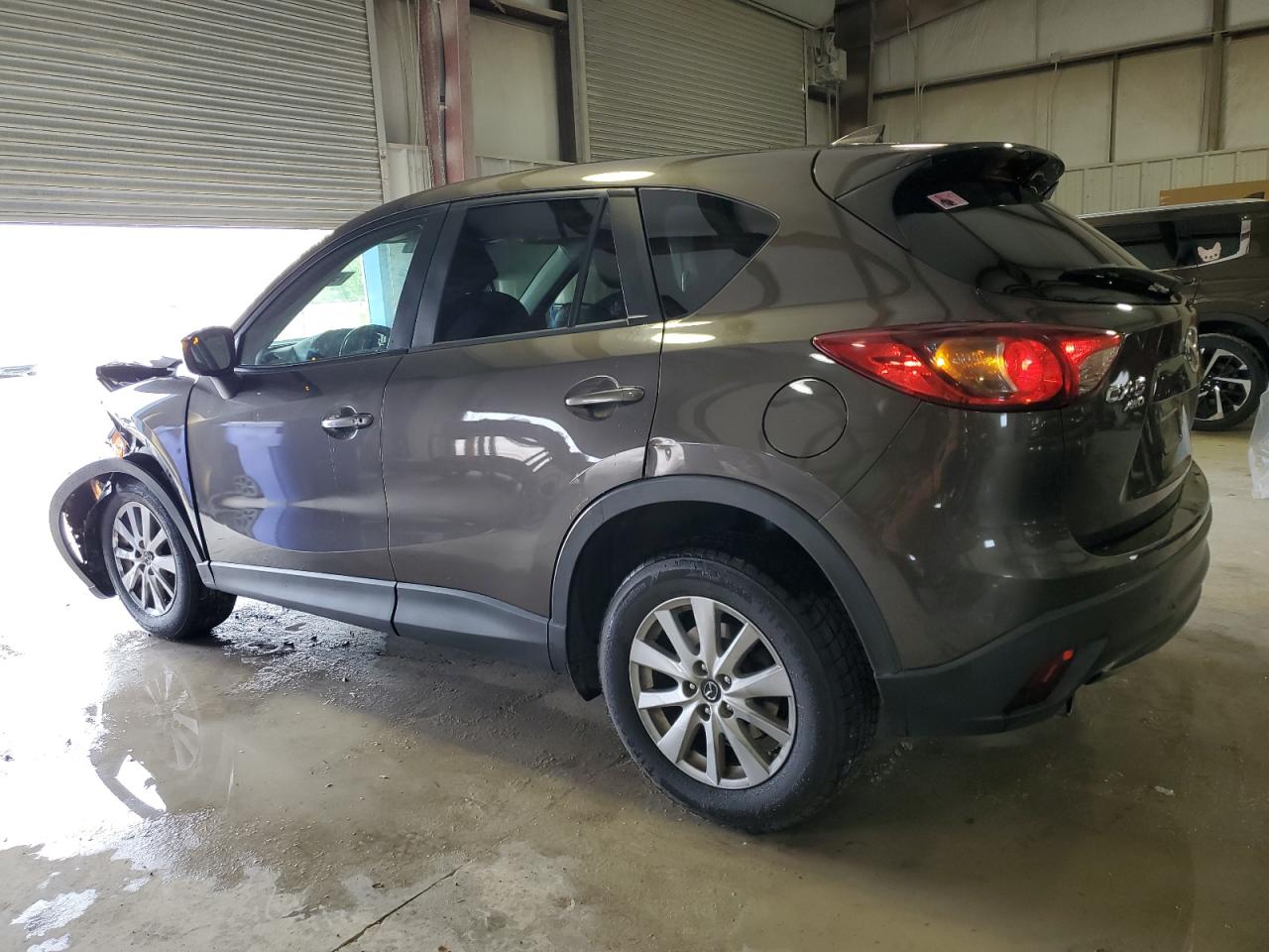 2016 Mazda CX-5 VIN JM3KE4CY5G0910649 Copart auction photo, front end / minor dent/scratches damage thumbnail 2