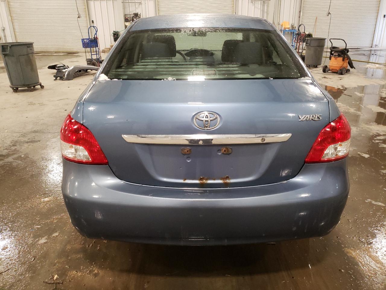 2012 Toyota Yaris VIN JTDBT4K38CL019655 Copart auction photo, front end / side damage thumbnail 6