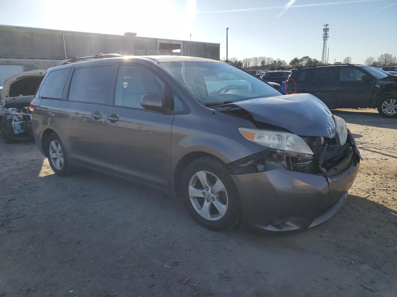 2011 Toyota Sienna VIN 5TDKK3DCXBS165630 Copart auction photo, front end damage thumbnail 4
