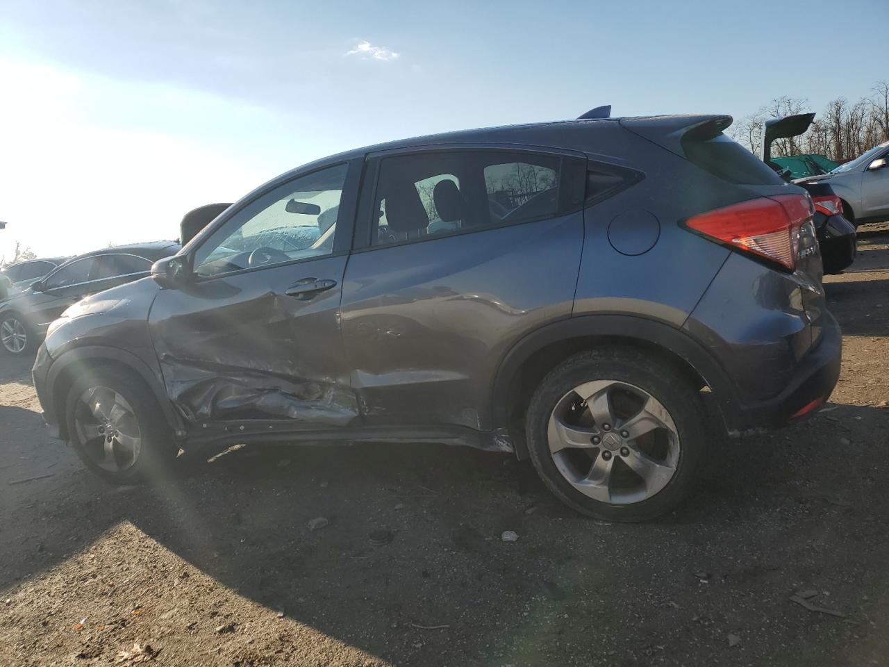 2017 Honda HR-V VIN 3CZRU6H54HM717566 Copart auction photo, side / rear end damage thumbnail 2