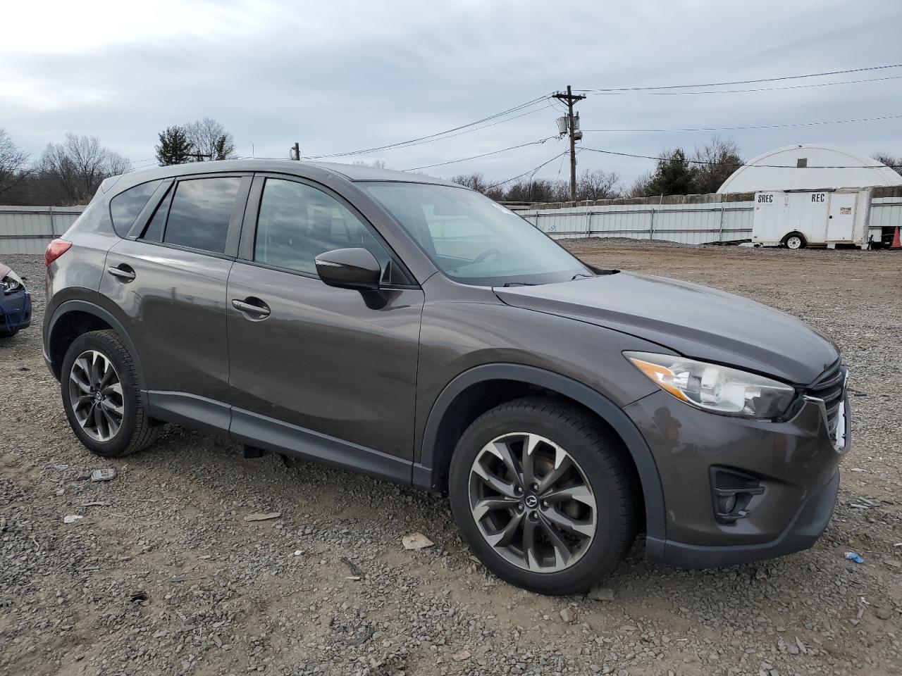 2016 Mazda CX-5 VIN JM3KE4DY2G0763835 Copart auction photo, front end damage thumbnail 4