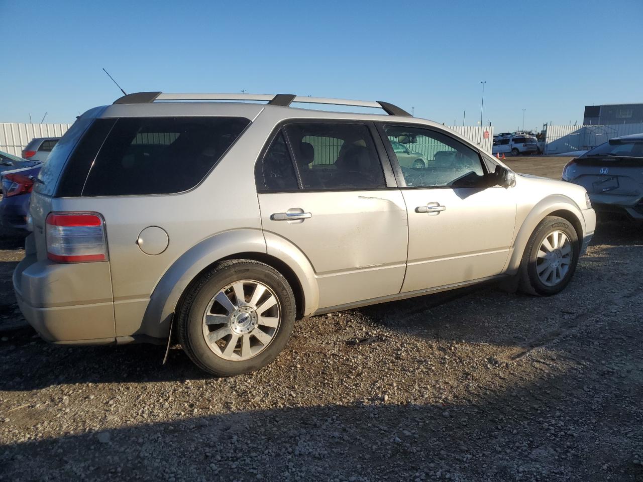 2008 Ford Taurus VIN 1FMDK06W28GA06260 Copart auction photo, side / front end damage thumbnail 3